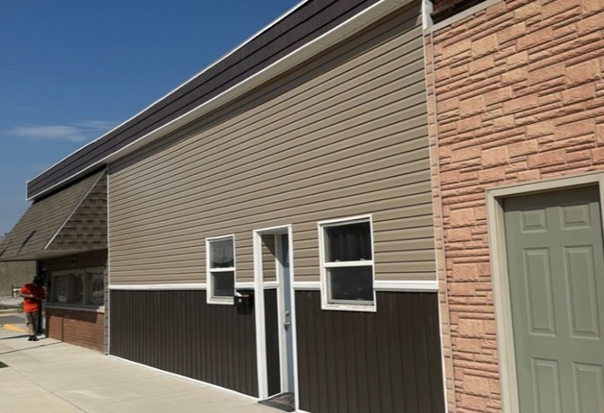 Exterior renovation after new siding and trim