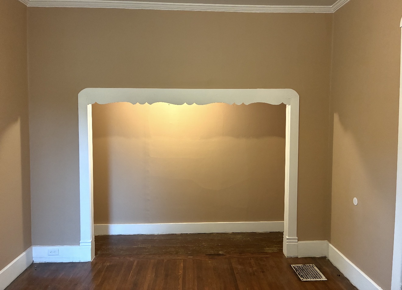 Original interior opening with white decorative trim