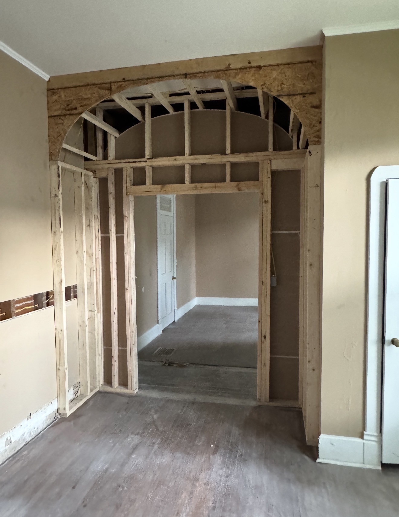 New curved archway framing above an interior doorway